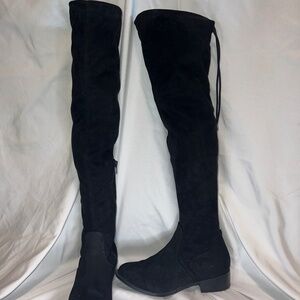 Thigh high black boot
